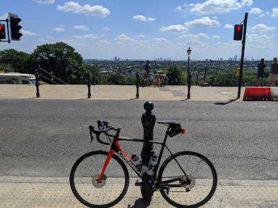 Gareth's bike at Alexandra Palace, with a view of London.